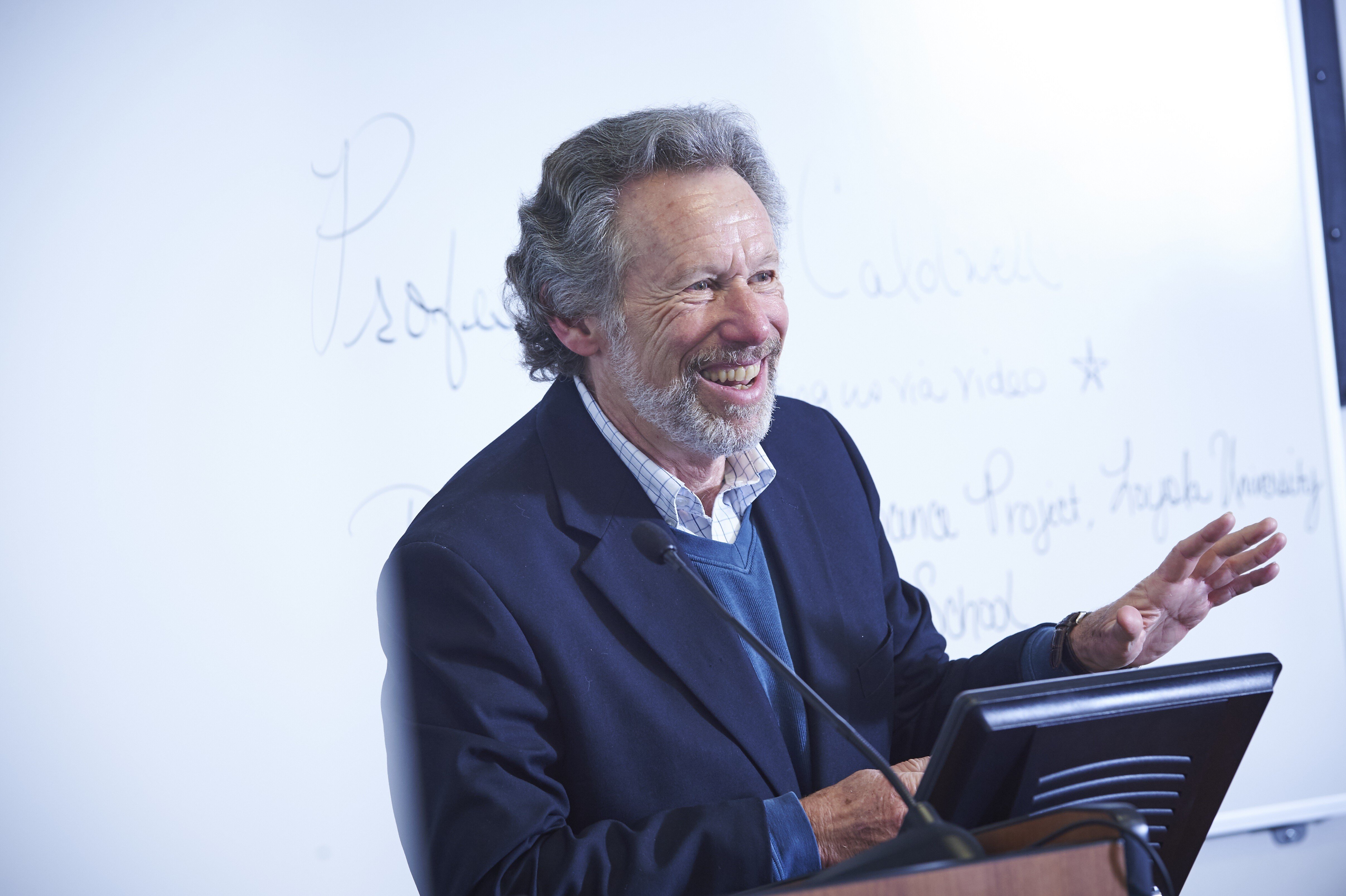 Photo of Norm Fell at lectern